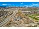 Aerial view of neighborhood with park and highway at 8645 S Field St, Littleton, CO 80128