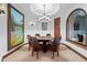 Game room with a pool table, leather chairs, and a large landscape painting at 7944 Dante Dr, Littleton, CO 80125