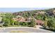 Luxury home with a tile roof, nestled in a scenic landscape at 7944 Dante Dr, Littleton, CO 80125