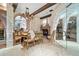 Rustic wine cellar tasting room with stone fireplace at 7944 Dante Dr, Littleton, CO 80125