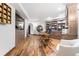 Home office with built-in shelves and hardwood floors at 7944 Dante Dr, Littleton, CO 80125