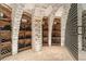 Extensive wine storage in a brick cellar at 7944 Dante Dr, Littleton, CO 80125