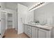 Double vanity bathroom with granite countertop and a walk-in shower at 2855 Rock Creek Cir # 191, Superior, CO 80027