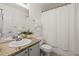 Clean bathroom with granite countertop and shower/tub combo at 2855 Rock Creek Cir # 191, Superior, CO 80027