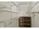 Large closet with wire shelving and additional storage at 17473 E Mansfield Ave # 111Wl, Aurora, CO 80013