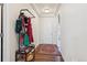 Inviting entryway with coat rack and decorative rug at 6860 Sea Oats Dr, Parker, CO 80138