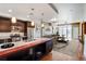 Modern kitchen with stainless steel appliances and large island at 2001 Lincoln St # 1024, Denver, CO 80202