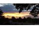Scenic sunset view from the property, capturing vibrant colors in the sky at 6803 S Liverpool St, Centennial, CO 80016
