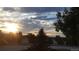 Stunning sunset view from the property, showcasing a serene landscape at 6803 S Liverpool St, Centennial, CO 80016