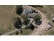 Aerial view of house, yard, and parking area at 6803 S Liverpool St, Centennial, CO 80016