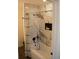 Modern bathroom with marble tile and a bathtub at 7935 Chase Cir # 170, Arvada, CO 80003