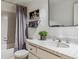 Bathroom with tub, shower, and updated vanity at 6960 E Girard Ave # 409, Denver, CO 80224