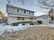 Two-story house with attached garage and updated exterior at 8834 E Radcliff Ave, Denver, CO 80237