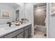 Bathroom with double vanity and a bathtub at 16501 W 93Rd Ave, Arvada, CO 80007