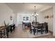 Bright dining room with hardwood floors and view of kitchen at 10334 Milwaukee Cir, Denver, CO 80229