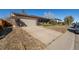 Brick ranch home with driveway and street view at 4981 Xanadu St, Denver, CO 80239