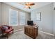 Home office with built-in desk and comfortable armchair at 4171 Happy Hollow Dr, Castle Rock, CO 80104