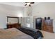 Main bedroom with a king-size bed and ample space for furniture at 56 W 8Th Ave, Byers, CO 80103