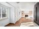 Bright living room with wood floors, built-in shelves and fireplace at 10611 Holland St, Broomfield, CO 80021