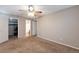 Spacious bedroom with ample closet space and ceiling fan at 539 Wright St # 208, Lakewood, CO 80228