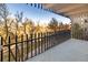 View from balcony overlooking tree-lined street and cityscape at 460 S Marion Pkwy # 604, Denver, CO 80209