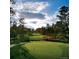 Picturesque golf course with lush green fairways and trees at 6192 Oxford Peak Ln, Castle Rock, CO 80108
