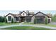Elegant home with large windows and landscaping at 6192 Oxford Peak Ln, Castle Rock, CO 80108