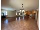 Open concept kitchen with granite countertops and wood cabinets at 22840 E Heritage Pkwy, Aurora, CO 80016