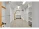 Spacious walk-in closet with ample shelving and hanging space at 14955 W 58Th Pl, Golden, CO 80403