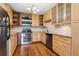 Bright kitchen with stainless steel appliances and granite countertops at 655 S Alton Way # 6A, Denver, CO 80247