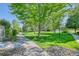 Landscaped community green space with walkways at 8016 E Fairmount Dr, Denver, CO 80230