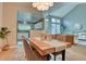 Modern dining area with a view into kitchen and Gathering room at 8016 E Fairmount Dr, Denver, CO 80230