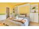 Bright bedroom with murphy bed and ample closet space at 8016 E Fairmount Dr, Denver, CO 80230
