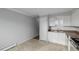 Kitchen with white cabinets and stainless steel appliances at 1628 Chester St, Aurora, CO 80010