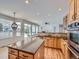 Spacious kitchen, granite island, stainless steel appliances, and ample cabinet space at 7447 Soapstone Way, Castle Rock, CO 80108