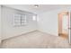 Secondary bedroom featuring a window and neutral decor at 7447 Soapstone Way, Castle Rock, CO 80108