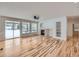Bright Gathering room with hardwood floors, fireplace and backyard access at 7447 Soapstone Way, Castle Rock, CO 80108