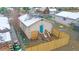 Backyard with gravel, wooden fence, and small deck at 3040 W 66Th Ave, Denver, CO 80221
