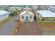Aerial view of a snow-covered house and yard at 3040 W 66Th Ave, Denver, CO 80221