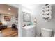 Simple bathroom with a single vanity and toilet at 3040 W 66Th Ave, Denver, CO 80221