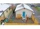 Backyard with gravel, wooden fence, and small deck at 3040 W 66Th Ave, Denver, CO 80221