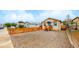 Cute bungalow with teal door and wood fence at 3040 W 66Th Ave, Denver, CO 80221