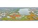 Aerial view of community near lake and baseball fields at 3040 W 66Th Ave, Denver, CO 80221