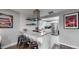 Kitchen with granite countertops and breakfast bar at 3040 W 66Th Ave, Denver, CO 80221