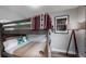 Bedroom with a bunk bed and southwestern decor at 3040 W 66Th Ave, Denver, CO 80221