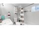 Clean bathroom with a tub shower, and updated vanity at 3040 W 66Th Ave, Denver, CO 80221