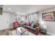 Living room with comfy seating and western decor at 3040 W 66Th Ave, Denver, CO 80221