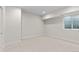 Bright and airy basement bedroom with large window at 2468 S Cherokee St, Denver, CO 80223