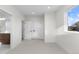 Bright bedroom with access to bathroom and closet at 2468 S Cherokee St, Denver, CO 80223