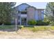 Front view of building with landscaping at 8065 W Eastman Pl # 6-303, Denver, CO 80227